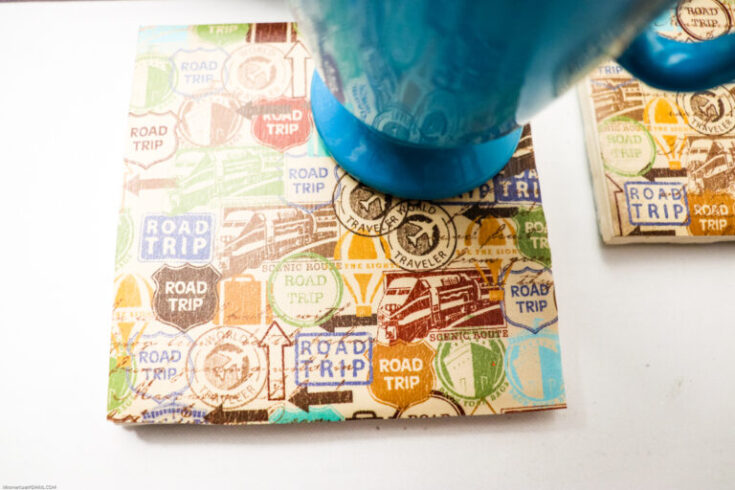 The possibilities with these simple DIY Decoupage Tile Coasters are endless. There are so many things you could do with this and it is a great way to use up that extra stash of scrapbook paper you have running around.